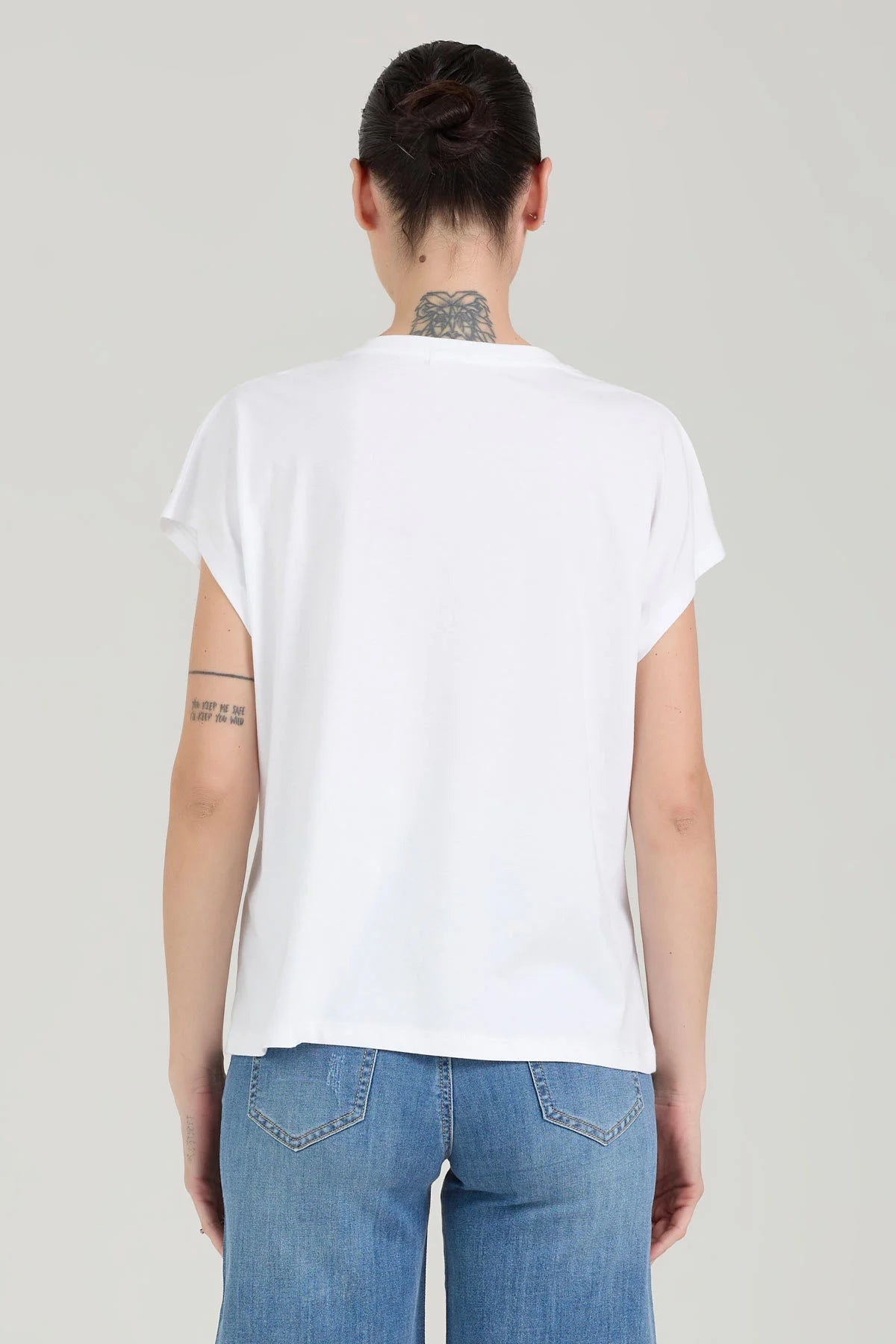 T-shirt applicazione spalla