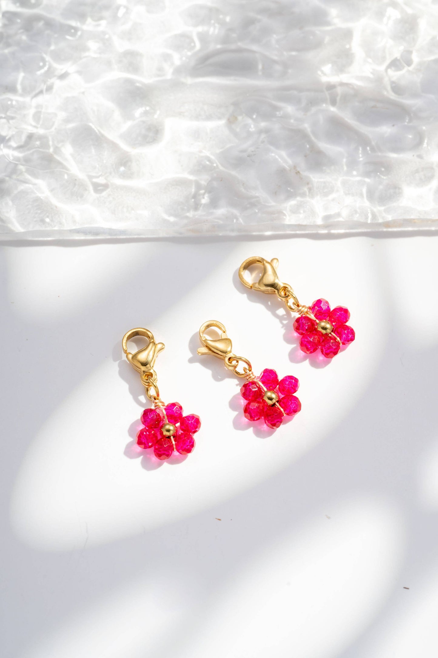 Set di Tre Pendenti con Fiori Colorati in Acciaio Inossidabile,