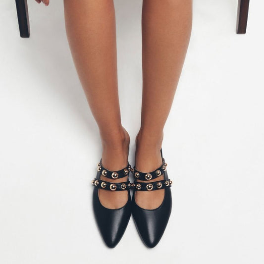 SCARPA GIOSEPPO MULES IN PELLE NERA CON BORCHIE AHNAPEE
